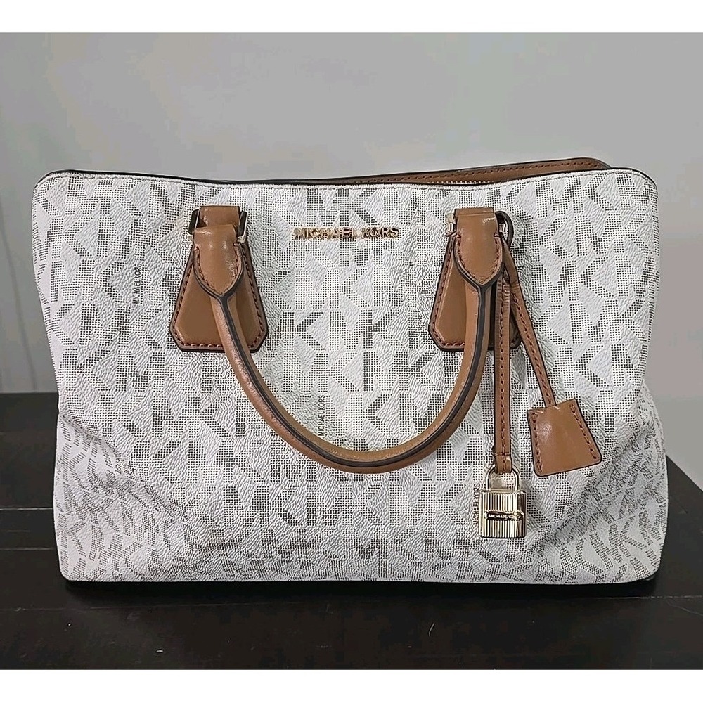 Michael Kors Camille large signature logo satchel in the vanilla/acorn color.